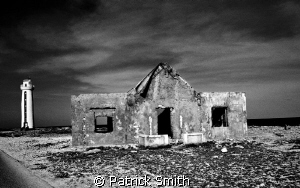 An old film shot of the light keepers home and Lighthouse... by Patrick Smith 